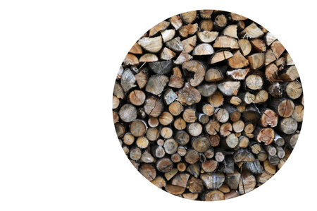 textured firewood background of chopped wood for kindling and heating the house. a woodpile with stacked firewood. the texture of the birch tree.curly texture of chopped firewoodの写真素材