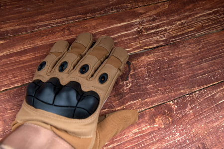 Military gloves, tactical gloves, protective gloves isolated white background. Wrist. Full Finger...