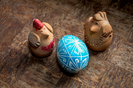 Festive Easter background featuring an Easter bread cake adorned with glaze, chocolate, and eggs. Ideal for an Easter greeting card, ad, promotion, or poster, showcasing a vibrant composition andの写真素材