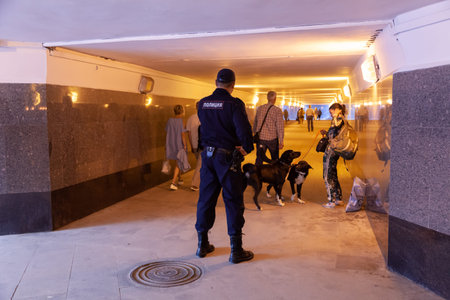 Russia Moscow 2019-06-17 Russian policeman officer standing back to camera with inscription Police...
