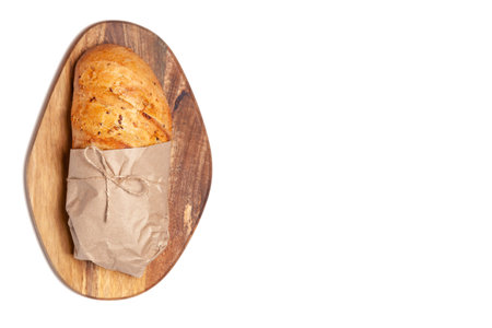 Close-up fresh cereal bread in craft paper