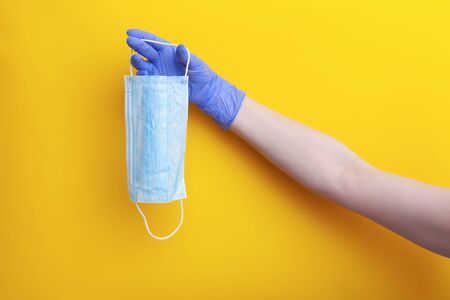 Surgical medical mask for prevent respiratory virus in doctor handの写真素材