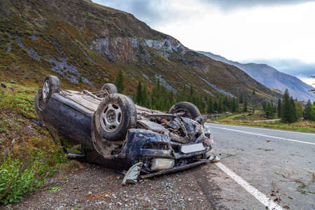 Crushed car accident place on a bendの写真素材
