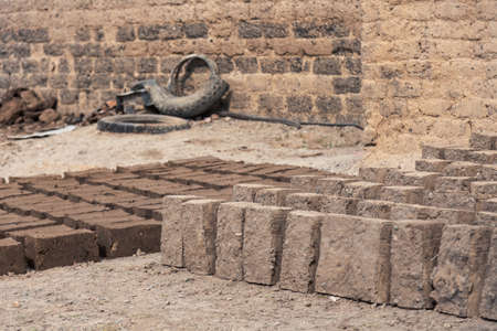 Production of clay brick in stacks, bricks are arranged on one by oneの写真素材