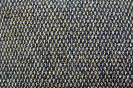 Fabric texture of coarse burlap gray. Knitting.