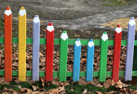 Decorative fence in the form of colored pencils.の写真素材