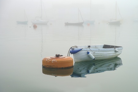 Sea boat in the fog. Ships at foggy background.の写真素材