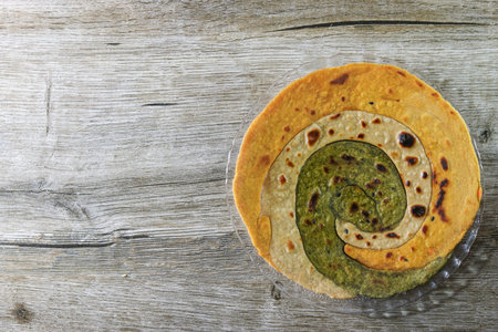 Paratha is the flatbread which is basically an Indian dish. Paratha can be plain or stuffed. The paratha is mainly made up of maida or wheat flour.の写真素材