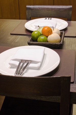 Modern kitchen table with fruitsの写真素材