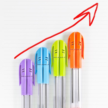 color pen business graph with arrow showing profits and gainsの写真素材
