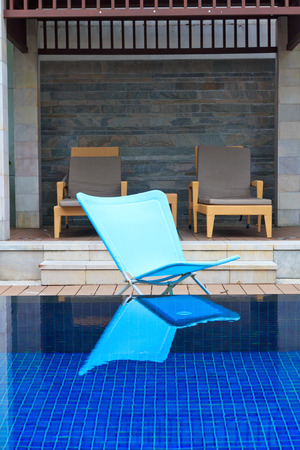 Relax chairs luxury hotel swimming poolのeditorial素材