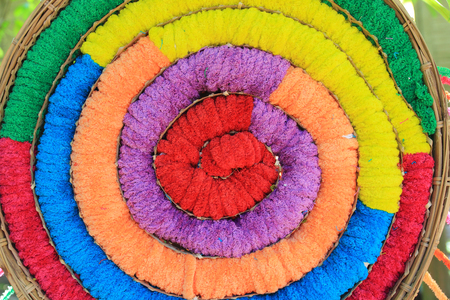 Beauty color silk turnovers in the rolling round, backgroundの写真素材