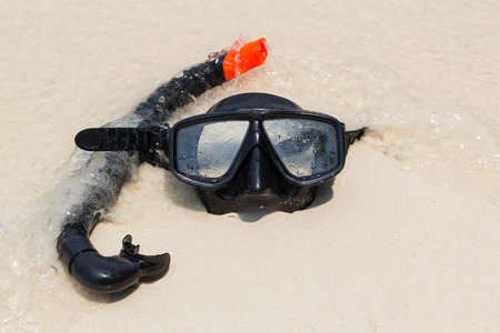 Diving mask and snorkel on the beachの写真素材