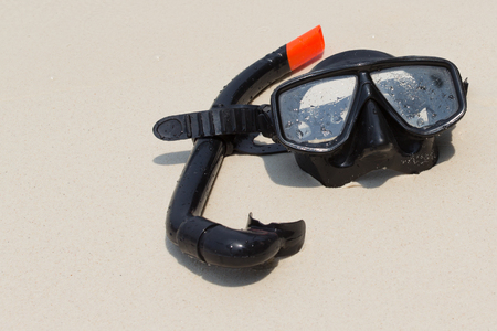 Diving mask and snorkel on the beachの写真素材