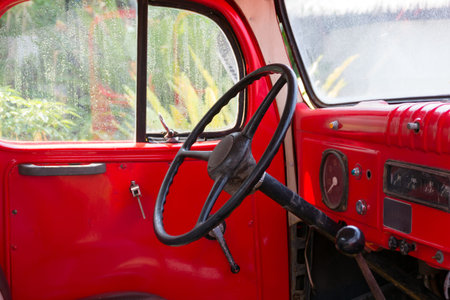 Interior of classic vintage red car.