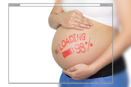 Web site page design concept,  pregnant Asian Woman with painted brush word - loading and figures 98% on white background.の写真素材