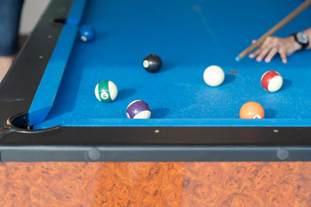 Vintage pool ball on blue table background.