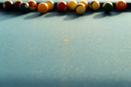 Vintage pool ball on blue table background.の写真素材
