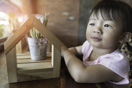Asian cute baby girl happiness in the cafe.の写真素材
