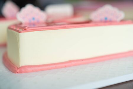 Beautiful pink color cake for happy birthday, Close up cake textured.の写真素材