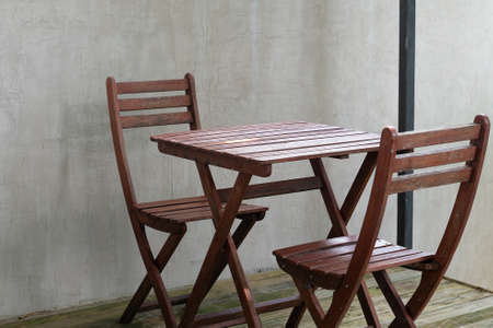 Old wood chair in coffee cafe shop, vintage style.の写真素材