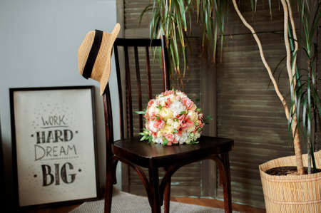 Wedding bouquet on a chairの写真素材