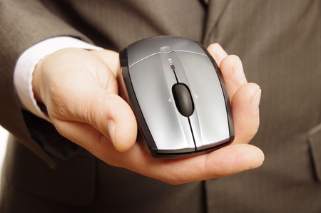 man holding computer mouseの写真素材