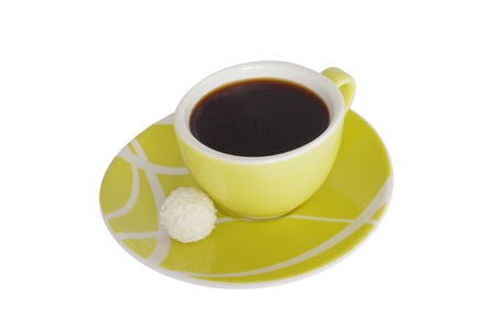 a cup of coffe with a sweet on white backgroundの写真素材