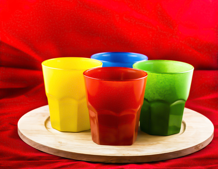 Colored glasses on trayの写真素材