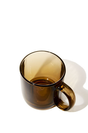 The isolated image one empty glass from dark glassの写真素材