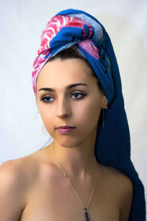 The girl drying hair after a showerの写真素材