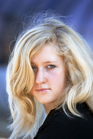 Portrait of the young woman with blond hair