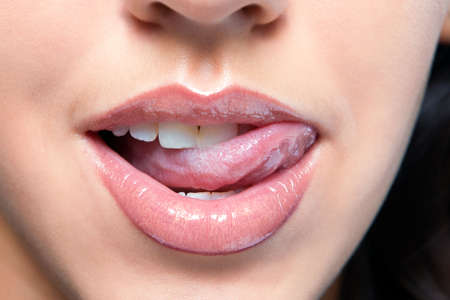 Close up a smiling mouth of the girlの写真素材