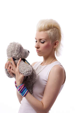 A beautiful girl with a Teddyの写真素材