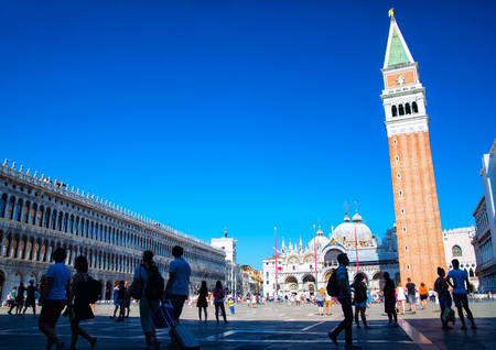 Piazza San Marco with the Basilica of Saint Mark and the bell tower of St Mark's Campanile in Venice, Italyの写真素材