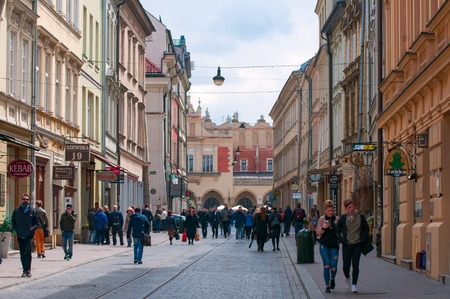 pedestrian tourist street in the old town in Krakow, Poland - May 2017のeditorial素材