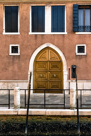 Beautiful doors in Venice in old style, Italy Venice.の写真素材