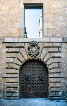 antique metal door in Barcelona day. Catalonia, Spainの写真素材