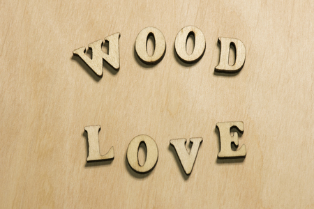 The words Wood and Love on a vintage wooden backgroundの写真素材