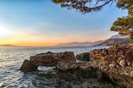 view of the rocky beach at sunset Croatia