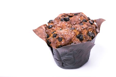 Fresh muffin with chocolate in wrapping paper on white backgroundの写真素材