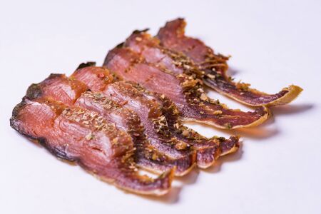isolated pieces of dried fish with red meat of pink salmonの写真素材