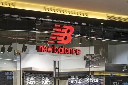 Minsk Belarus October 2019. New Balance sign on the store in the Mall. illustrative editorialのeditorial素材