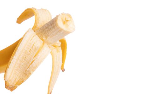 peeled banana on white background.の写真素材
