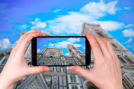 Duomo Santa Maria Del Fiore in Piazzale Michelangelo in Florence, Tuscany, Italy. tourist takes a photoの写真素材