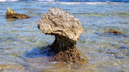 stones in the water on the beach. stones cut by water in the red sea sinai peninsulaの写真素材