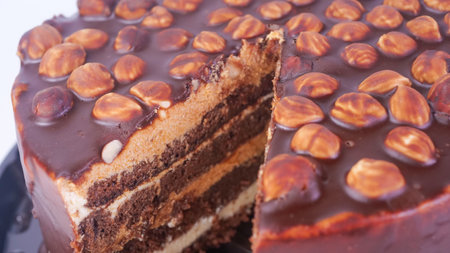 chocolate cake close-up. cake decorated with nuts.の写真素材