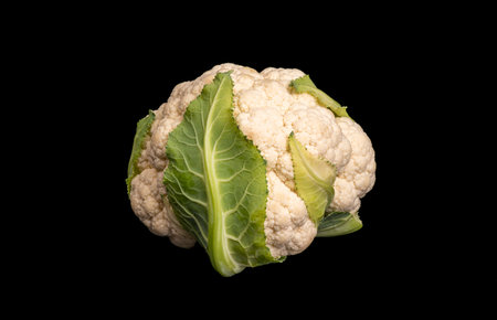cauliflower close up on black background.の写真素材