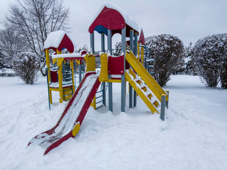 Snow covered playground in winter.の写真素材