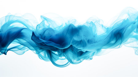 Blue ink in water on white background. Abstract background. Close upの素材